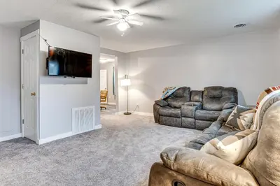 a living room with a couch and two chairs at Pets Welcome! Quiet Economy Home with Spacious Yard in Economy