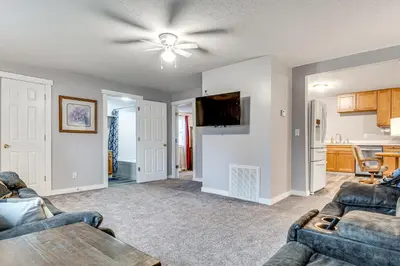 a living room with two couches and a ceiling fan at Pets Welcome! Quiet Economy Home with Spacious Yard in Economy