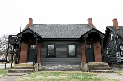 a black house with a black roof at Green Oasis - Studio in Downtown Lexington in Lexington