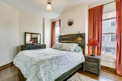 a bedroom with a bed and a window at 6 Mi to Dtwn Cincinnati Dog-Friendly Apt with Yard in Cincinnati
