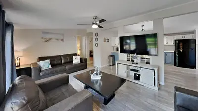 a living room with a couch and a flat screen tv at Put-in-Bay Island Club #21 in Put-in-Bay