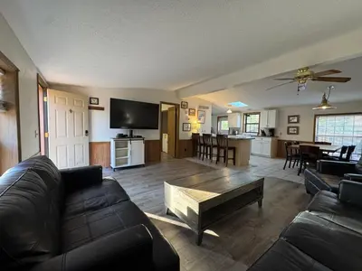 a living room with a couch and a table at Put-in-Bay Island Club #61 in Put-in-Bay