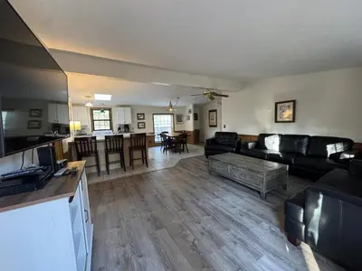 a living room with a couch and a table at Put-in-Bay Island Club #61 in Put-in-Bay
