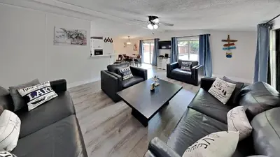 a living room with couches and a table at Put-in-Bay Island Club #108 in Put-in-Bay