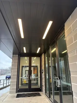 an external view of a building with glass doors at Studio apartment with easy access to the city in Cleveland