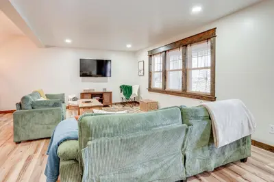 a living room with two couches and a tv at Amish Country Escape Decatur Family Farmhouse in Decatur