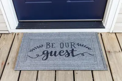 a door mat that says aint gonna be our guest at Perfectly Petite! in Ashland