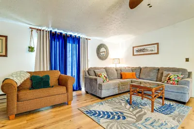 a living room with two couches and a table at Great for Families! Woodsy Hideaway in Decatur in Decatur