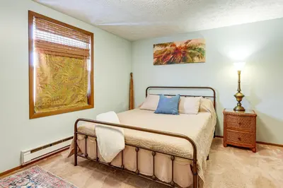 a bedroom with a bed and a window at Great for Families! Woodsy Hideaway in Decatur in Decatur