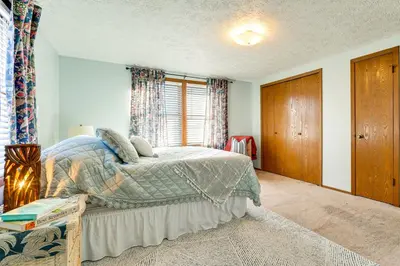a bedroom with a bed and a window at Great for Families! Woodsy Hideaway in Decatur in Decatur