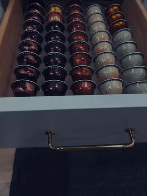 a drawer with a bunch of bowls in it at King suite and Hot Tub near the Greene in Dayton