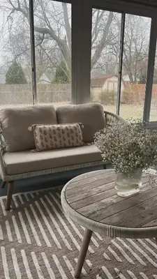 a living room with a couch and a coffee table at King suite and Hot Tub near the Greene in Dayton