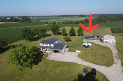 an aerial view of a house with a red arrow at Hot Tub & Firepit Your Winter Blues Retreat in Amherst