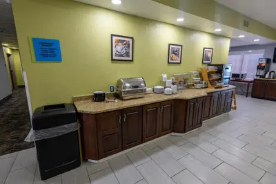 a kitchen with a counter in a store at Countryside Inn and Suites in Mount Orab