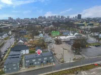 an aerial view of a city with a street sign at Modern Townhouse in Historic Building Walk to Downtown in Columbus