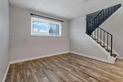 an empty room with a staircase and a window at Modern 4BR Retreat Fenced Yard Near Easton in Columbus