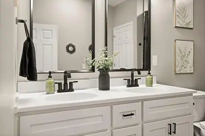 a bathroom with a white sink and a mirror at Romantic Secluded Hot Tub, Stargazing, Mt View in Stanton