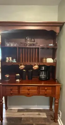 a wooden table with a tea pot on top of it at 2 bedroom hot tub home near NKU in Cold Spring