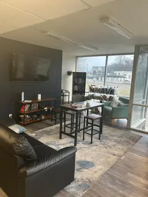 a living room with a couch and a table at Cozy 1 bedroom apartment near downtown Cincinnati in Cincinnati