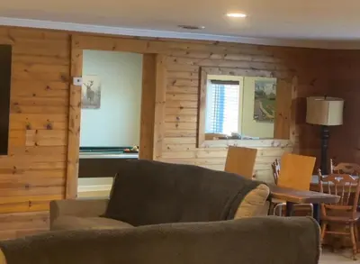 a living room with a couch and a table at Slice of Petersburg