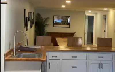 a kitchen with a sink and a counter top at Slice of Petersburg