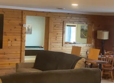 a living room with a couch and a table at Slice of Petersburg