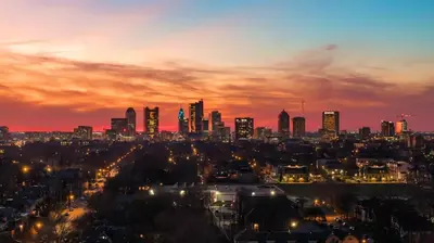 a view of a city at night with at Rooftop Patio, Hot Tub and Games City Escape in Columbus