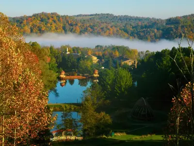 a view of a lake in the middle of a forest at Aniyor Apartment Loft