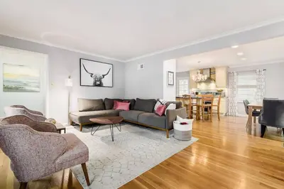 a living room with a couch and a table at Bexley Family Friendly ★ King Bed ★ Staycation in Columbus