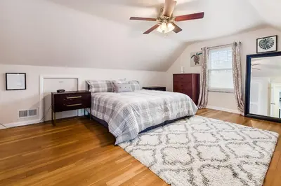 a bedroom with a bed and a ceiling fan at Bexley Family Friendly ★ King Bed ★ Staycation in Columbus