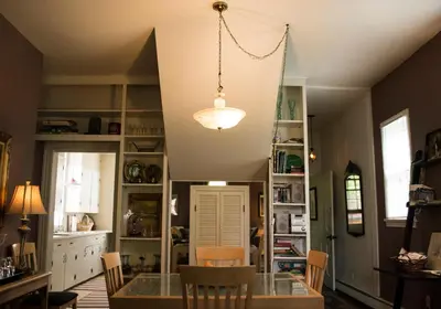 a dining room with a table and chairs at Clifford House Private Home B&B in Cleveland