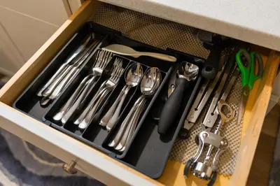 a drawer full of utensils in a kitchen drawer at Akron 2 Bed 1 Bath Flight Themed Oasis Dog Friendly in Akron