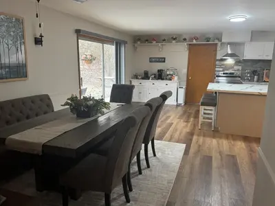 a kitchen and dining room with a table and chairs at Muncie 3 bedroom 2 bath brick home in Muncie