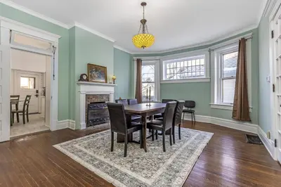 a dining room with a table and chairs at The Hazelton in Downtown Lancaster's Historic District in Lancaster