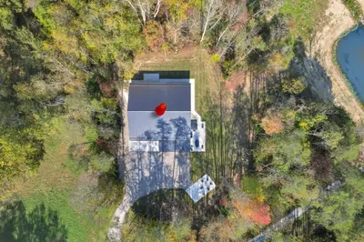 an aerial view of a house with a red ball on it at Pine Grove Barndominium in Sugar Grove