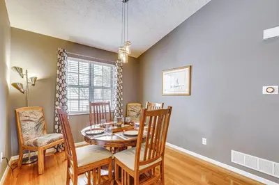 a dining room with a table and chairs at Castlerea Casa! Columbus Area Home with Yard in Hilliard
