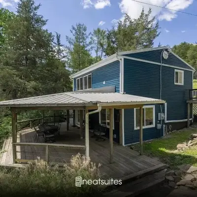 Lakefront Home with Boat Dock and Multiple Decks