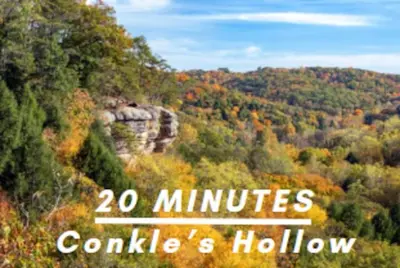 a picture of a forest with the words minutes to a castles hollow at Romantic Logan Cabin with Private Year Round Hot Tub Near Hocking Hills in Logan