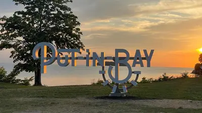a sign for a park with the words pottery day at Put-in-Bay Island Club #12 in Put-in-Bay