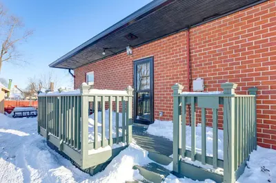 a house with a gate in the snow at Stay in the Heart of London! Walkable, Modern Home in London