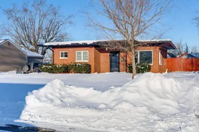 a pile of snow in front of a house at Stay in the Heart of London! Walkable, Modern Home in London