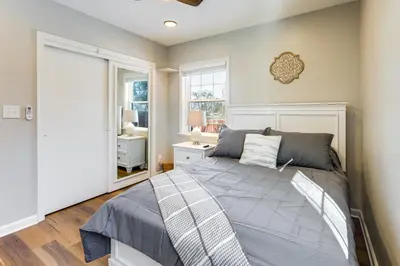 a bedroom with a bed and a window at Stay in the Heart of London! Walkable, Modern Home in London