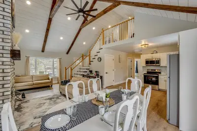 a dining room with a table and chairs at Willard Home On Working Farm with Water Views! in Willard