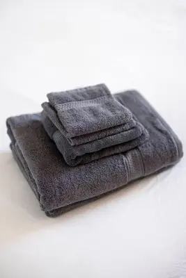 a pile of towels sitting on top of a table at CLE Large Loft/Wolstein/Progressive/Playhouse/CSU in Cleveland
