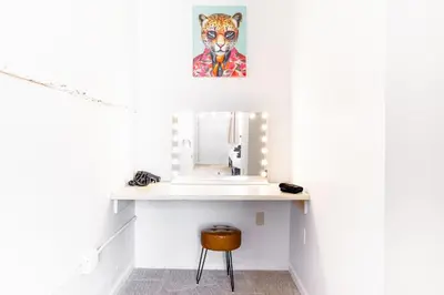 a bathroom with a sink and a mirror at CLE Large Loft/Wolstein/Progressive/Playhouse/CSU in Cleveland