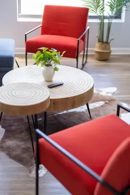 a living room with a table and two chairs at Cleveland Loft/Wolstein/Progressive/Playhouse/CSU in Cleveland
