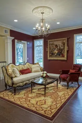 a living room with a couch and a table at The Mount Vernon Grand Hotel in Mount Vernon