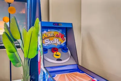 a childs play room with a happy my son game at Fun 2Bed Apt Skeeball Foosball FREE Parking in Cleveland