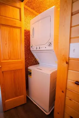 a washer and dryer in a small kitchen at Deer Run Retreat Villa in Bidwell