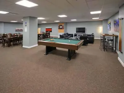 a billiard room with a pool table in it at Modern High-Rise Condo in Central Downtown | Gym in Cleveland